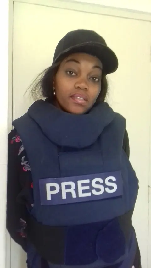 Reporter d'images, en gilet PRESS.